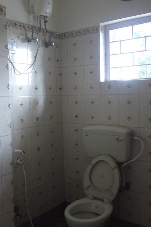 Megacity Inn Kalkutta Szoba fotó