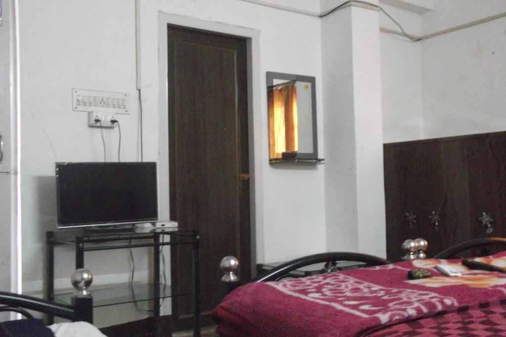 Megacity Inn Kalkutta Szoba fotó