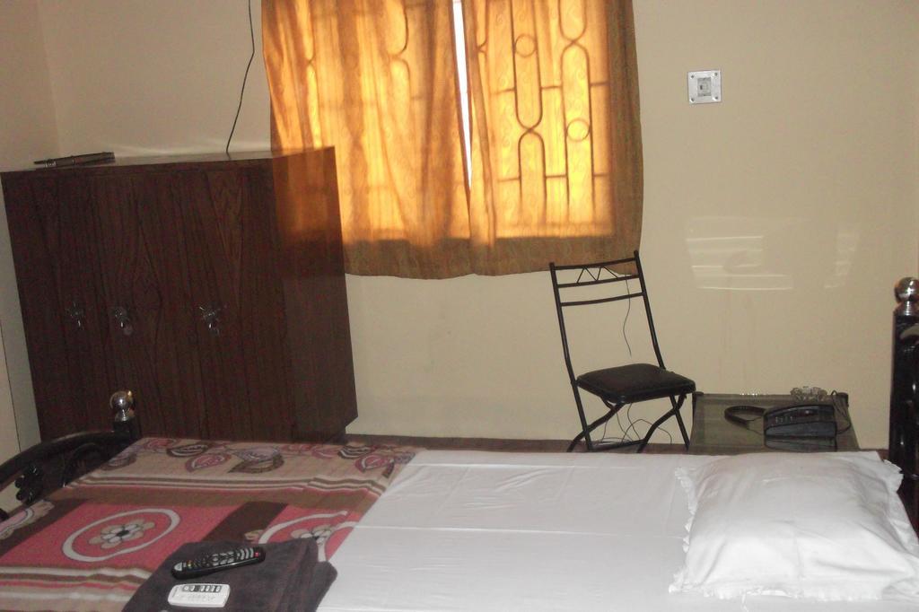 Megacity Inn Kalkutta Szoba fotó